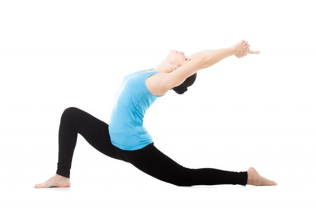 Sporty yogi girl doing exercises, asana Anjaneyasana, Low Lunge Yoga Pose, isolated on white background