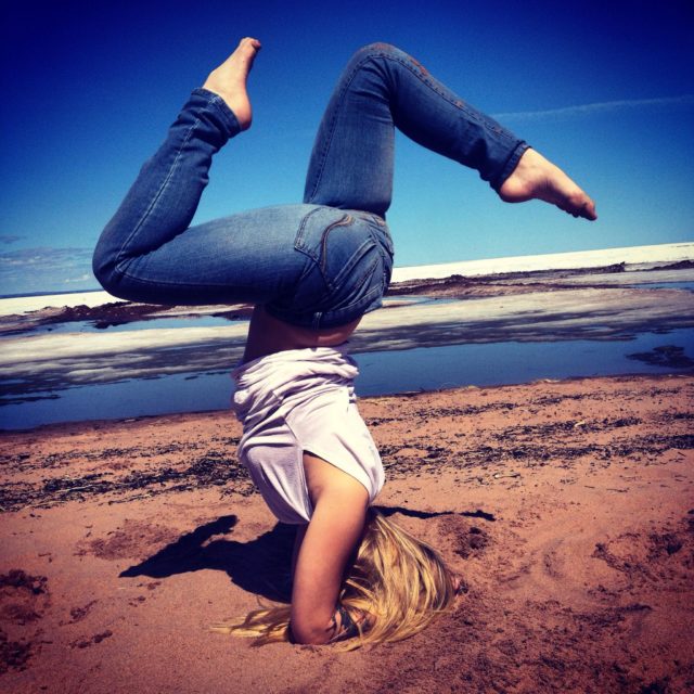 Instructor Joella Erin in a yoga pose