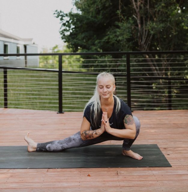 Instructor Joella Erin in a yoga pose