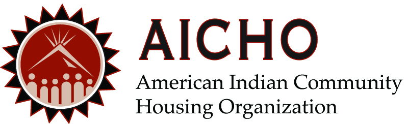 AICHOO logo featuring a sunburst design with an image of a stylized house and five people in white within a red circle. Beside the logo, the text reads: "AICHO American Indian Community Housing Organization." Enjoy this emblem while sipping coffee in Duluth, embracing community spirit.