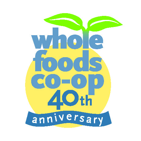 Logo for Whole Foods Coop Duluth MN’s 40th anniversary. The text "whole foods co-op 40th anniversary" is displayed in blue letters over a yellow circle. Above the text is a green plant sprout icon. A blue banner with the word "anniversary" is at the bottom.