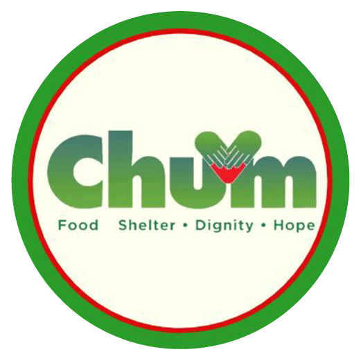 A circular logo with a green and red border featuring the word "Chum" in green gradient letters. The "u" is styled with two hands forming a heart shape. Below, it reads, "Food • Shelter • Dignity • Hope.