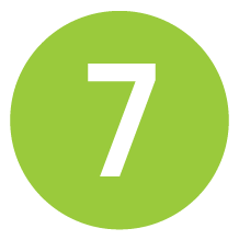A green circle with the white number 7 centered inside, reminiscent of the signage found at Whole Foods Coop in Duluth, MN.