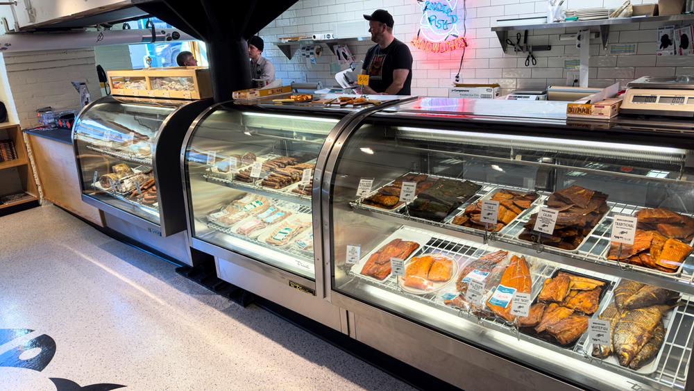 Deli counter with fish in glass case