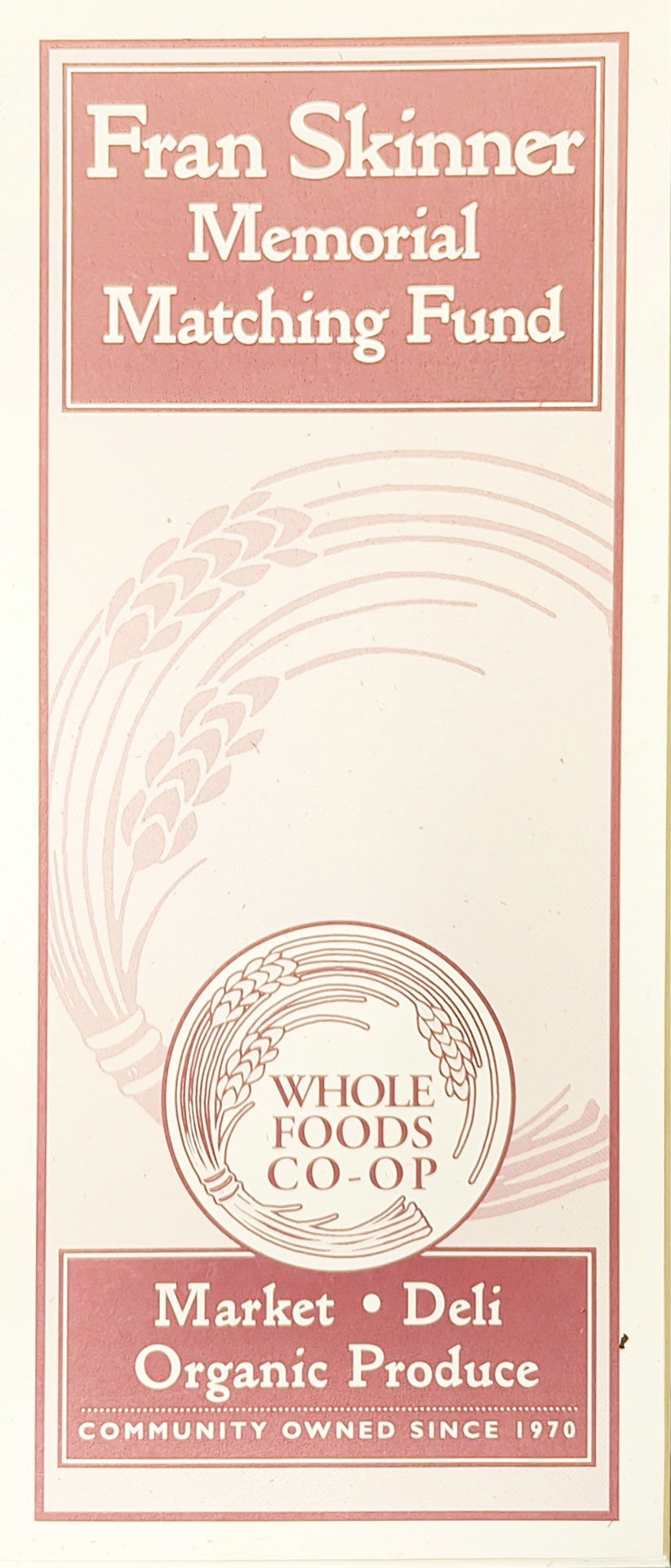 A vintage-style poster in sepia tones for the Fran Skinner Memorial Matching Fund, run by Whole Foods Co-op. The design includes a wheat graphic and text promoting organic produce at the market and deli, emphasizing community ownership since 1970. Proudly presented by Whole Foods Coop Duluth MN.