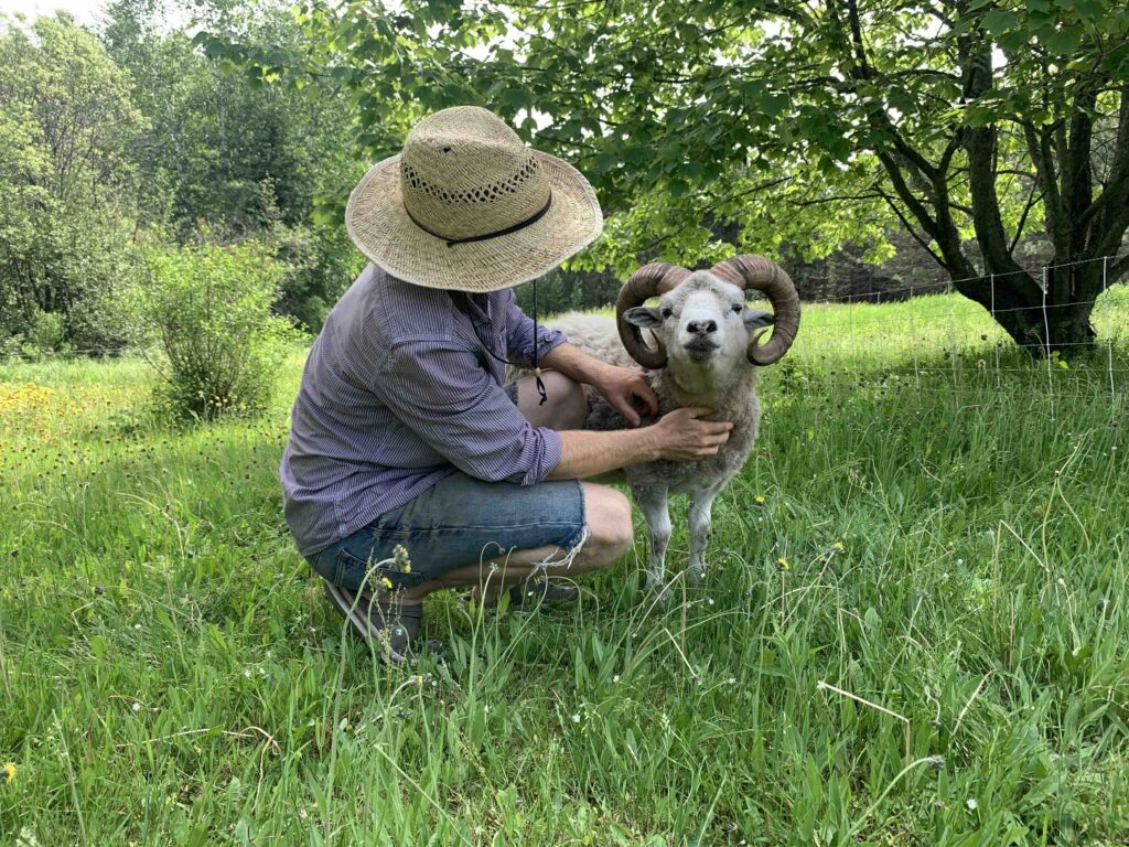 Farmer with goat