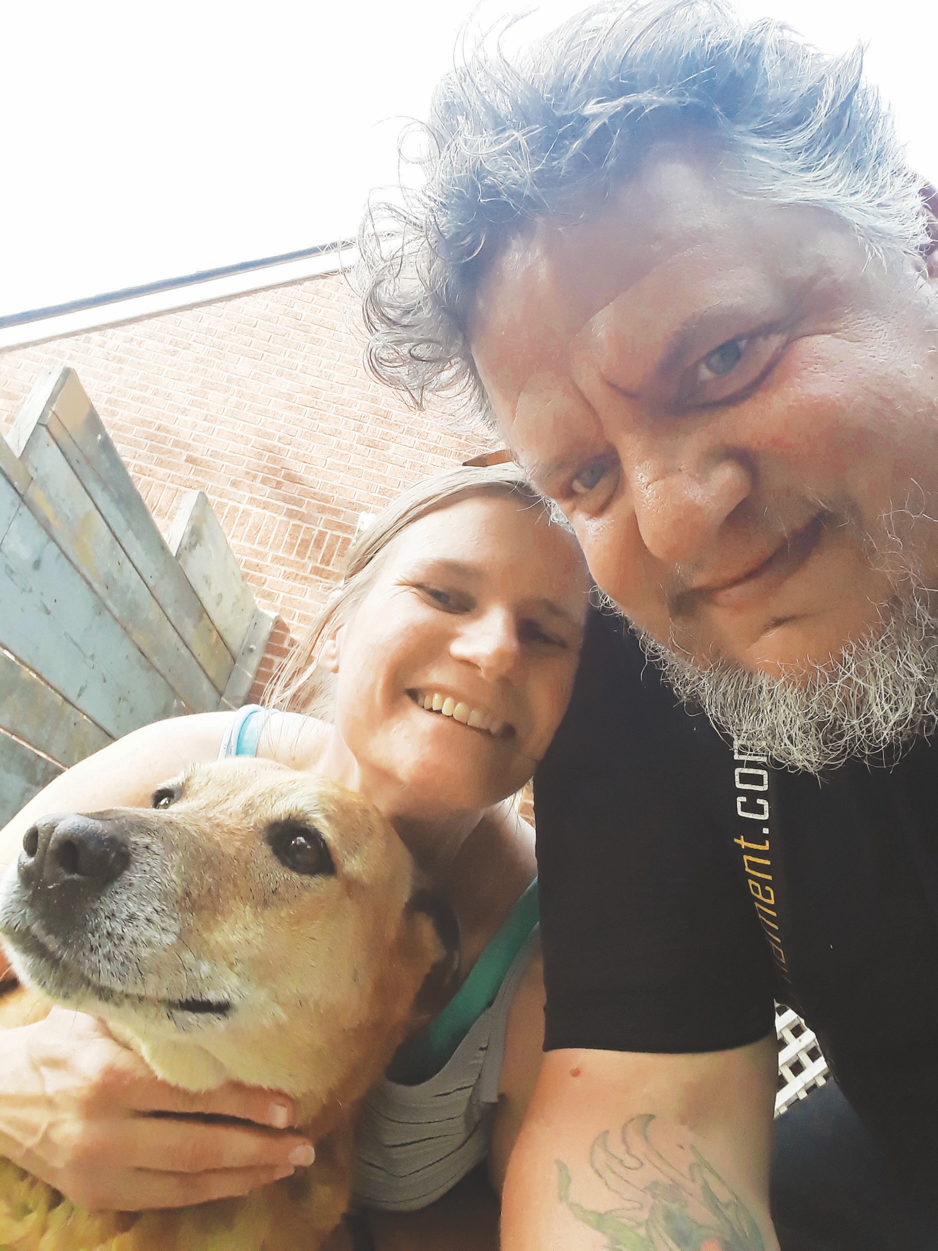 Shane Dickey, Gail Francis, and their dog