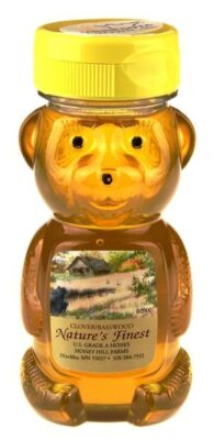 Bear-shaped honey bottle with label that reads, "Nature's Finest."