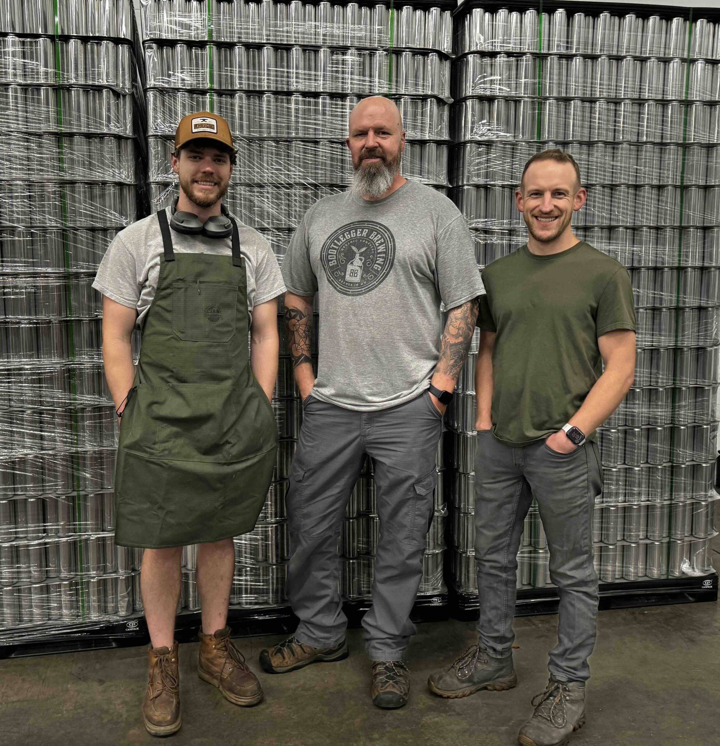 Dylan Hanlon (Production Manager), Jake Haneman (Owner),                             and Brandon Martin (Operations Manager) of Bootlegger Brewing