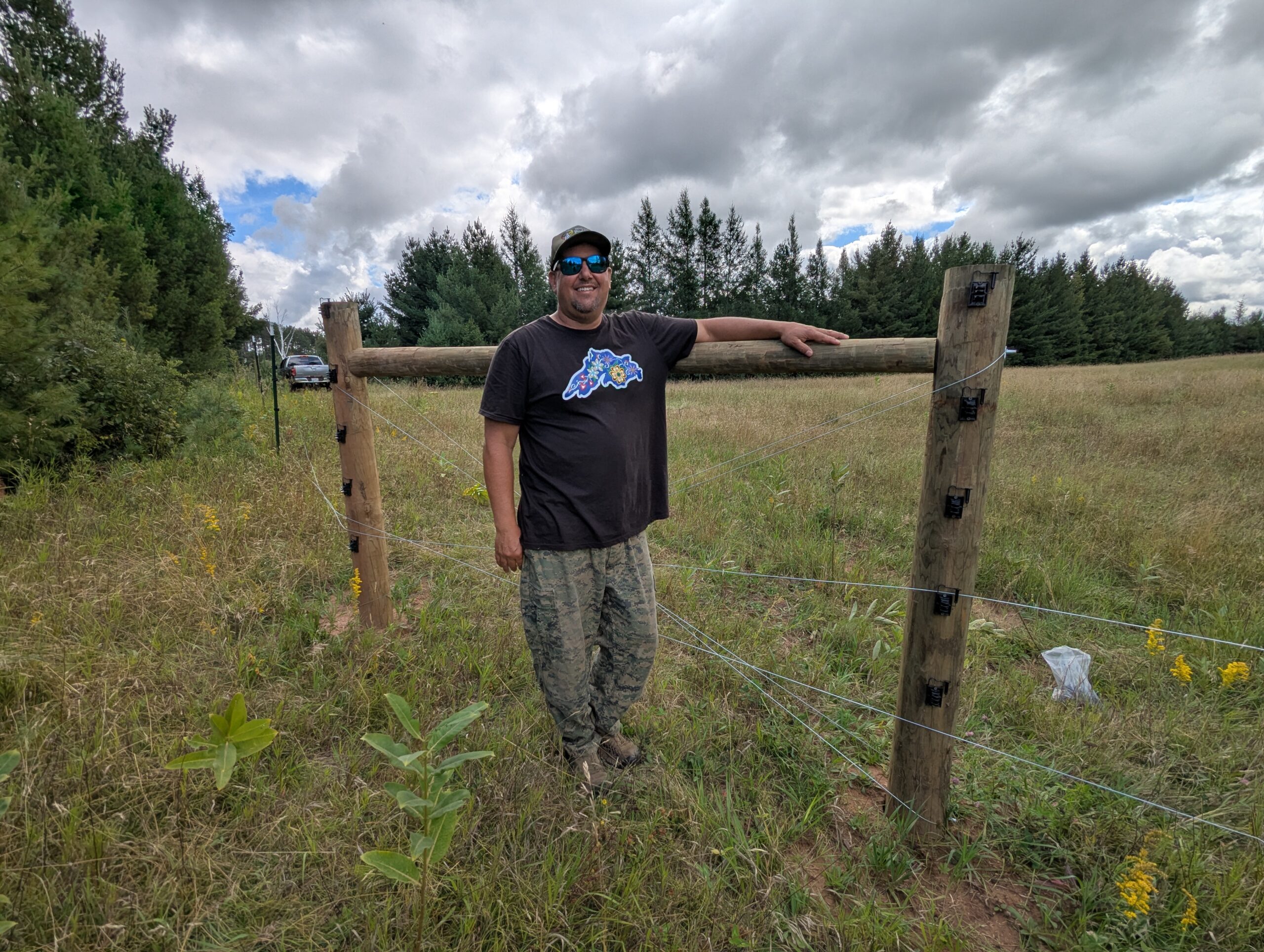 David Wise with the expanded fencing he installed through the Grow Local Food Fund Grant.